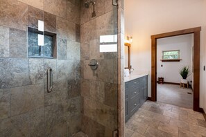 Shower, hair dryer, towels, shampoo