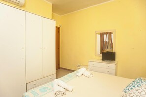 1 chambre, fer et planche Ă repasser, Wi-Fi, draps fournis