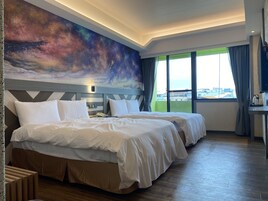 Deluxe Quadruple Room, 2 Double Beds | 1 bedroom, minibar, blackout drapes, free WiFi