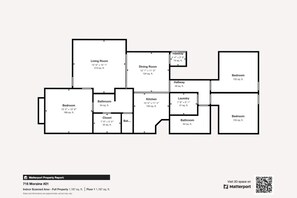 Planta baixa de um imóvel, 715 Moraine #21, com sala de estar, sala de jantar, cozinha, dois quartos, banheiro e área de lavanderia.