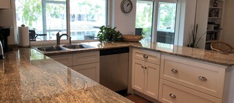 Lovely House on the canal with private dock, large fenced yard & pet friendly