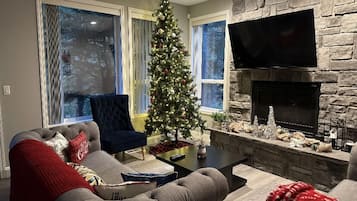 Smart TV, fireplace, foosball, books