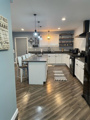 Fridge, microwave, dishwasher, coffee/tea maker