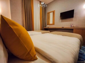 Chambre Standard avec lits jumeaux | Literie de qualité, minibar, coffre-fort