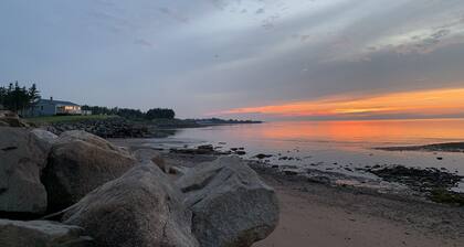 Oceanfront beach cottage panoramic views spectacular sunsets sandbars warm water