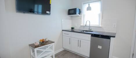 Fridge, microwave, coffee/tea maker, toaster