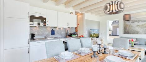 Fridge, stovetop, dishwasher, coffee/tea maker