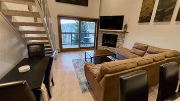 Smart TV, fireplace, books