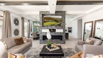 Smart TV, chimenea, futbolito y oficina