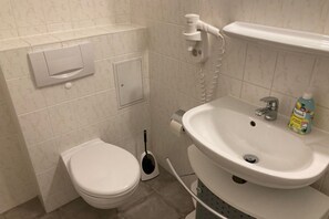 Dutxa i assecador de cabells 