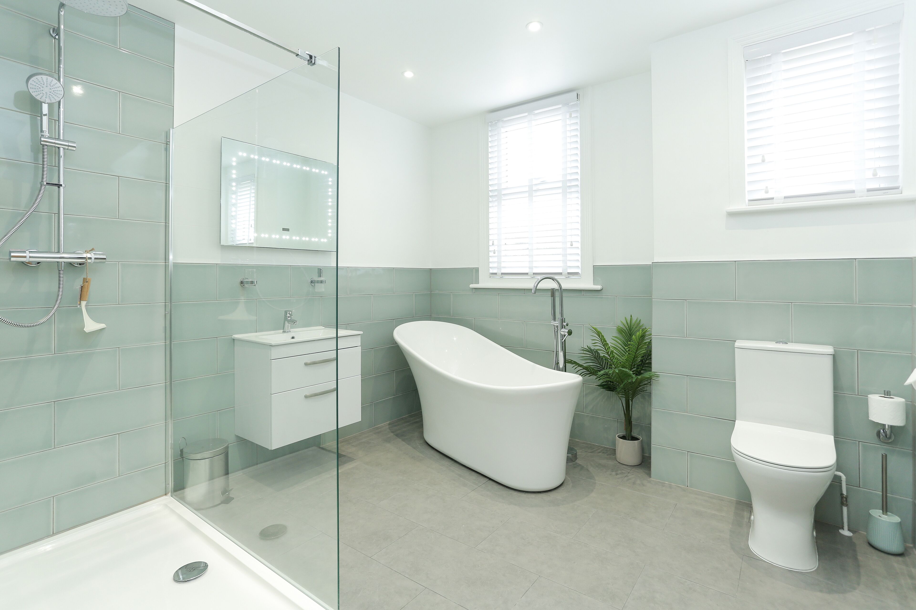 Bathtub, hair dryer, towels, soap