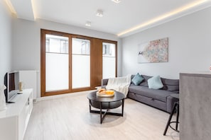 Deluxe Apartment | Living area | Smart TV