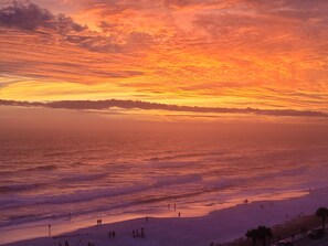 On the beach, sun-loungers