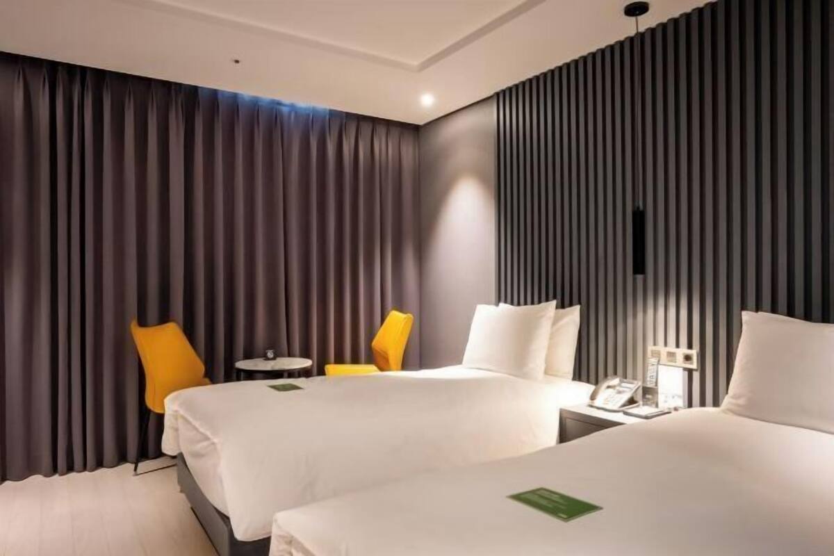 Down comforters, blackout drapes, soundproofing, WiFi (free)