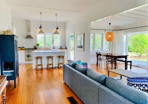 Family Quadruple Room | Living area | Flat-screen TV, DVD player