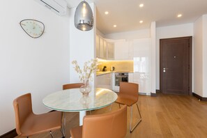 Appartement Deluxe | Repas dans la chambre