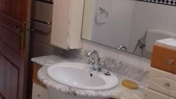 Room, 2 Bedrooms, Balcony, Garden View | Bathroom | Free toiletries, bidet, towels