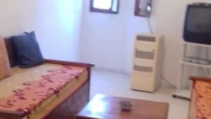Room, 2 Bedrooms, Balcony, Garden View | Living area | TV - Room-dar el Baraka - Banzart (Bizerte)