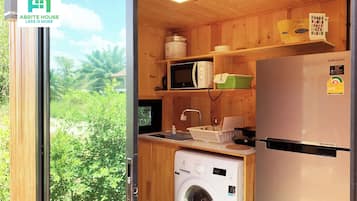 House, 1 Bedroom, Smoking, Balcony | Private kitchen | Microwave, electric kettle, dining tables
