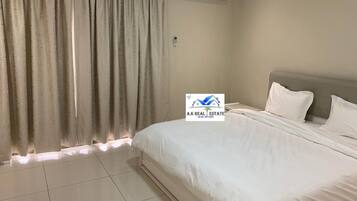 Apartment, 3 Bedrooms, Smoking, Balcony | 3 bedrooms, bed sheets