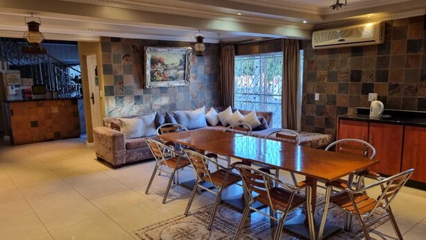 Room, 1 Bedroom, Accessible, Refrigerator | Dining - Savoy Lodge - Budget Triple Room 5 (Cape Town)