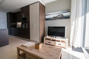 Apartment, 1 Bedroom, Patio, Ocean View | Living area