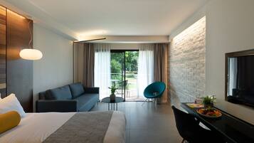Superior Room, Ground Floor | Minibar, desk, laptop workspace, blackout drapes