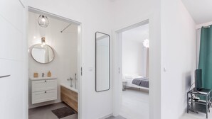 Deluxe Apartment | Living area | 55-inch Smart TV with digital channels, TV - Chill Apartments Ursynów (Warsaw)