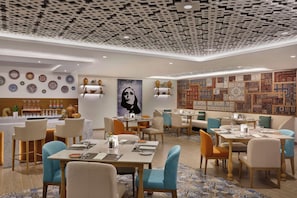3 restaurants, breakfast, lunch, dinner served; international cuisine