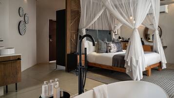 Premium bedding, down comforters, in-room safe, individually decorated