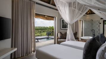 Premium bedding, down comforters, in-room safe, individually decorated