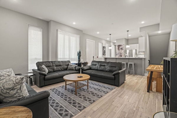 Sleek Open-Plan Living Space Perfect for Relaxing & Entertaining