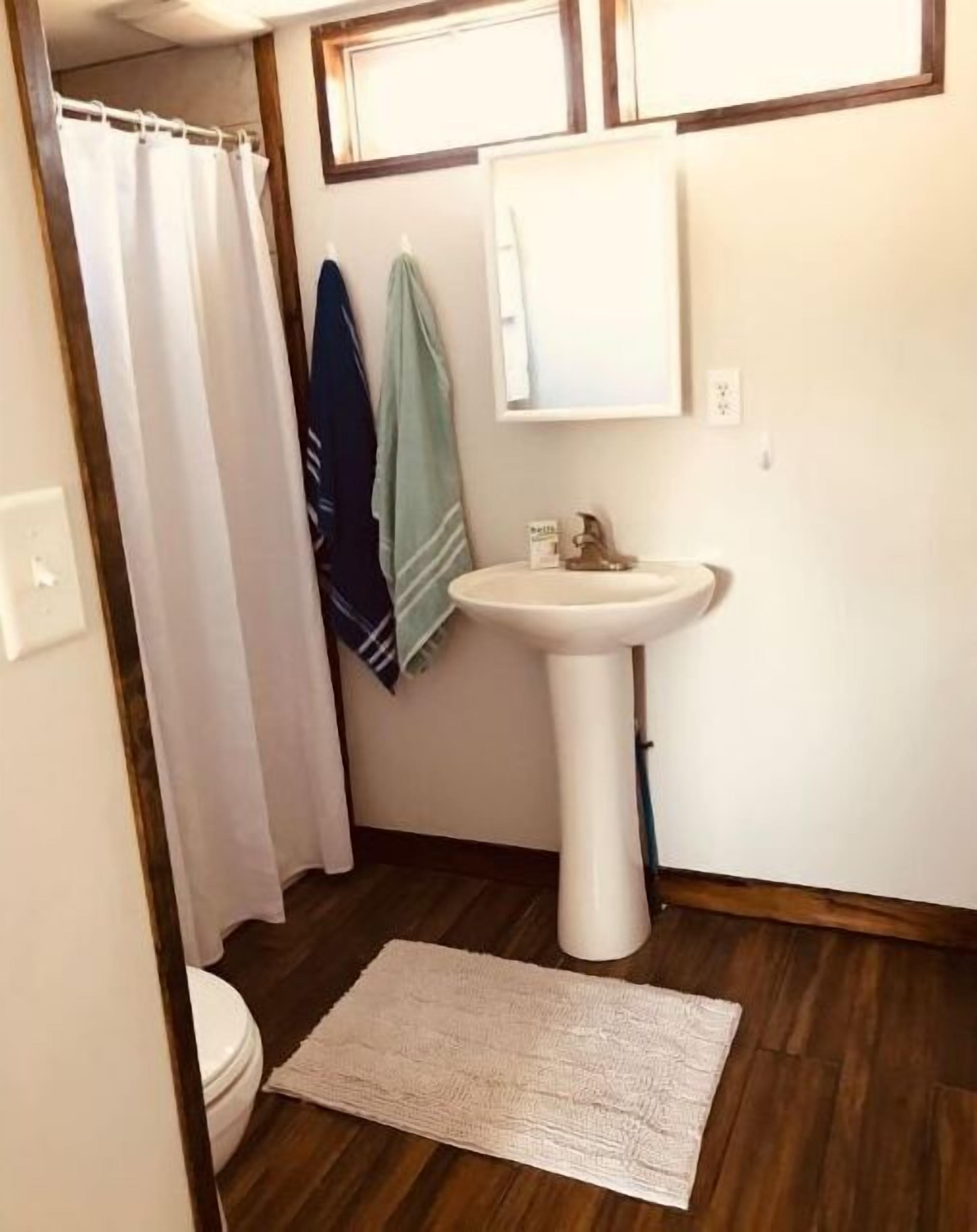 Shower, towels, soap, toilet paper