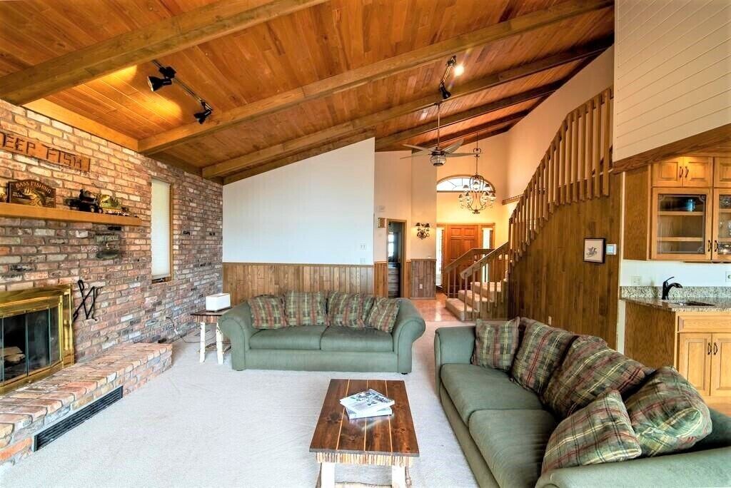 Magnificent 5 bedroom retreat home with beautiful sand beach on Whitefish Lake