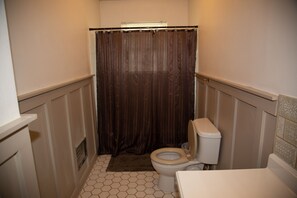 Bathtub, hair dryer, towels