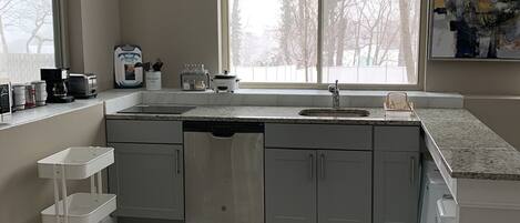 Fridge, microwave, stovetop, coffee/tea maker