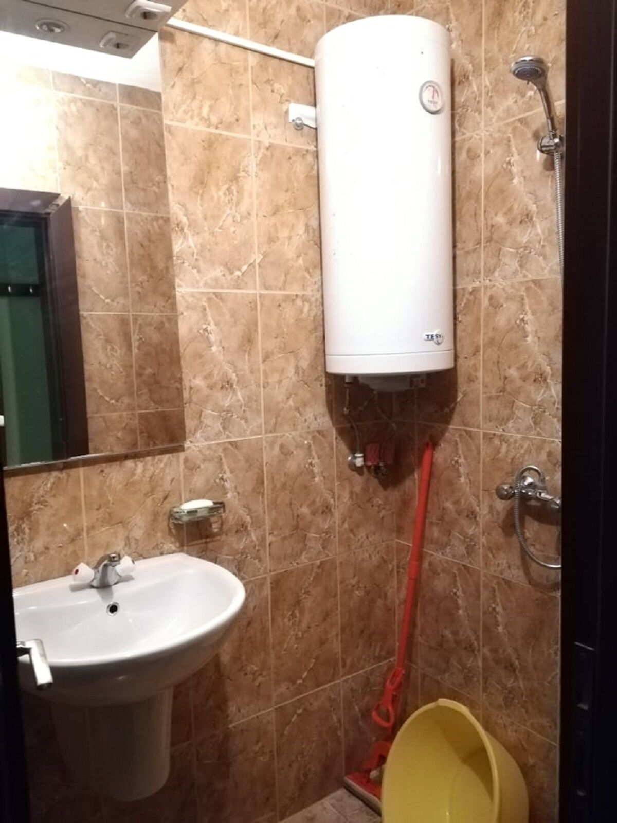 Shower, towels, soap, toilet paper