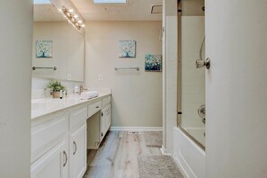 Combined shower/bathtub, hair dryer, towels, soap
