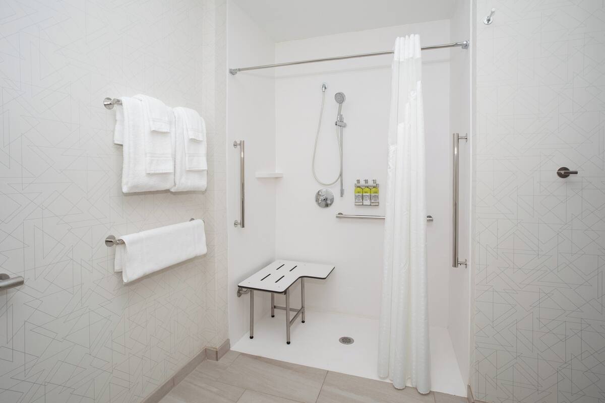 Premium bedding, down comforters, pillowtop beds, in-room safe