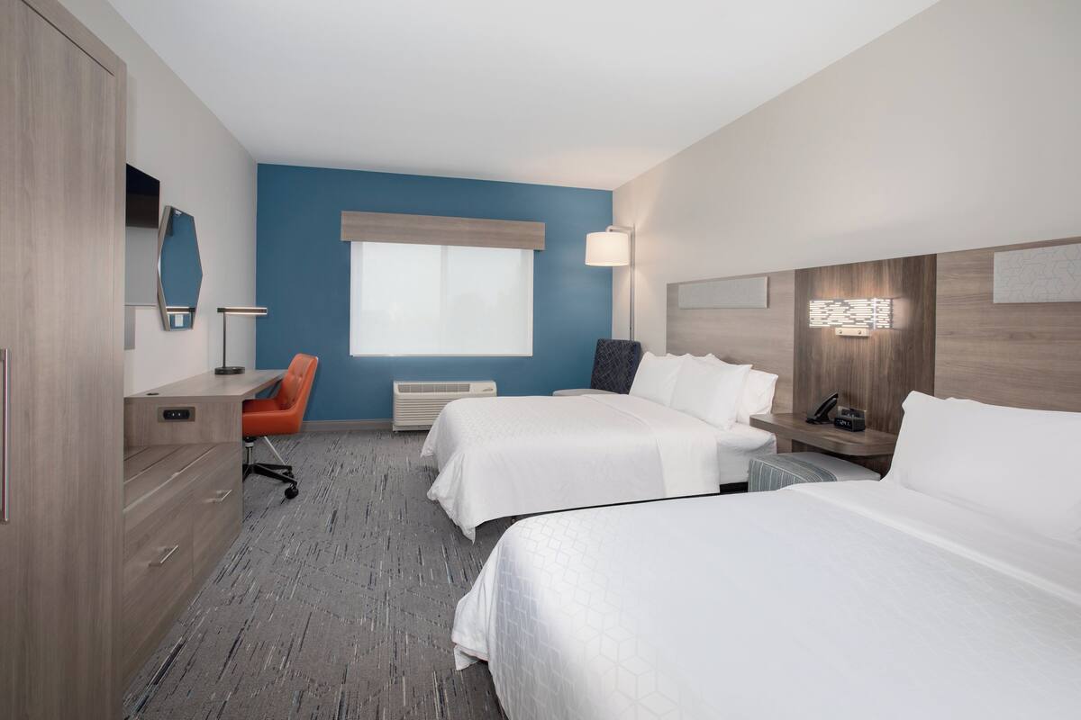 Premium bedding, down comforters, pillowtop beds, in-room safe