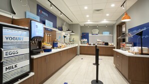 A modern café with a self-serve station for yogurt, eggs, and milk. - Holiday Inn Express and Suites Burley by IHG (Heyburn)