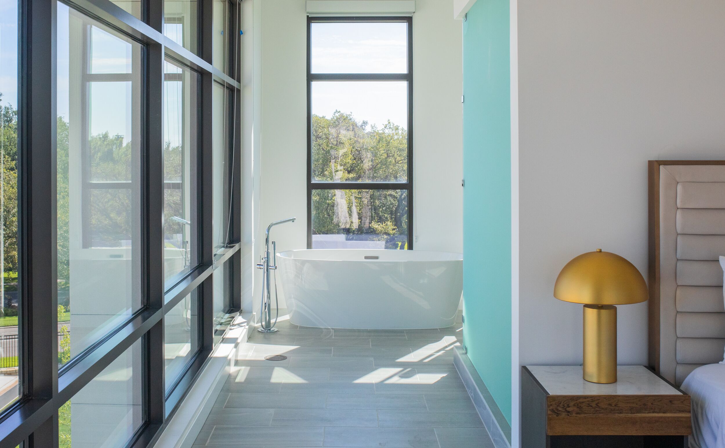 luxury loft | bathroom | designer toiletries, hair dryer, bathrobes, slippers