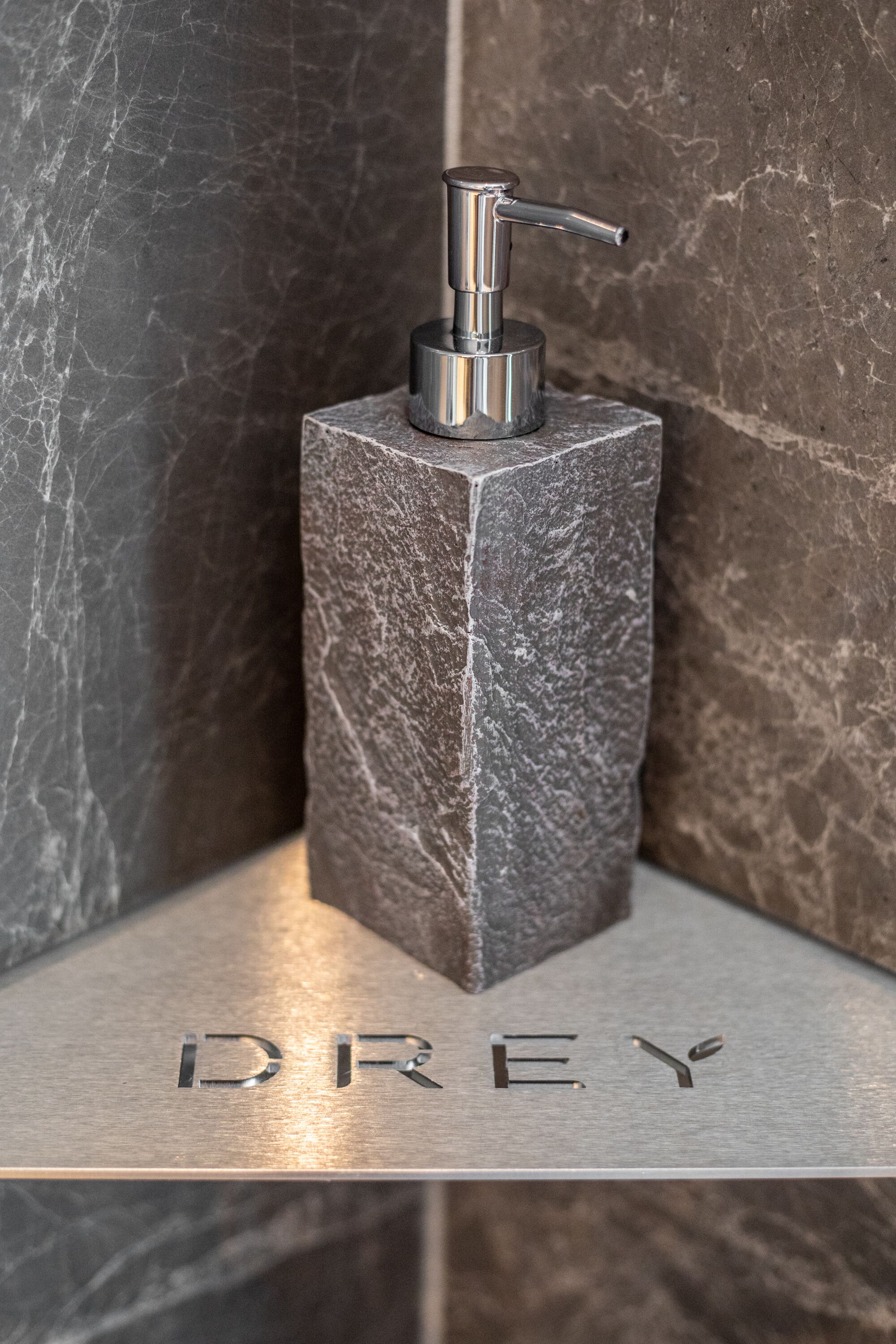 designer toiletries, hair dryer, bathrobes, slippers