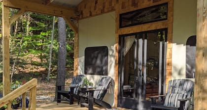 Custom design Safari Tent overlooking a serene running creek & natural waterfall