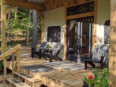 Custom design Safari Tent overlooking a serene running creek & natural waterfall