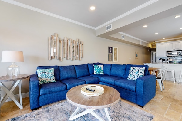 Kick back and enjoy time with friends and family in this cozy living room.