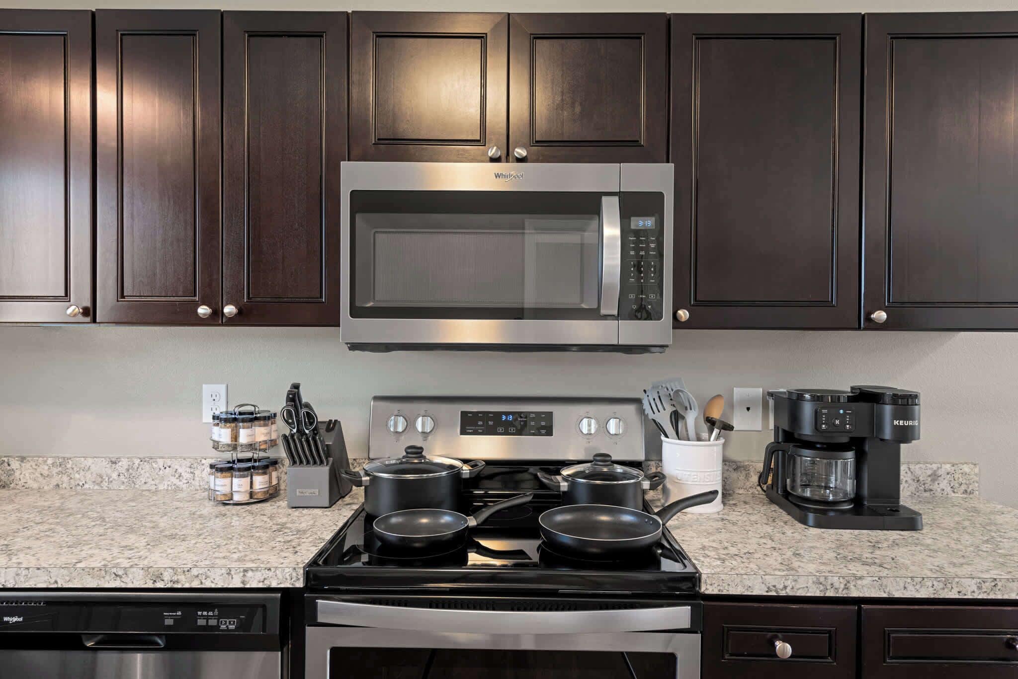 Coffee/tea maker, fridge, microwave, oven