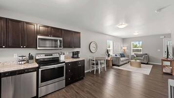 Coffee/tea maker, fridge, microwave, oven