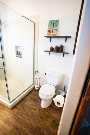 Combined shower/tub, hair dryer, towels, soap