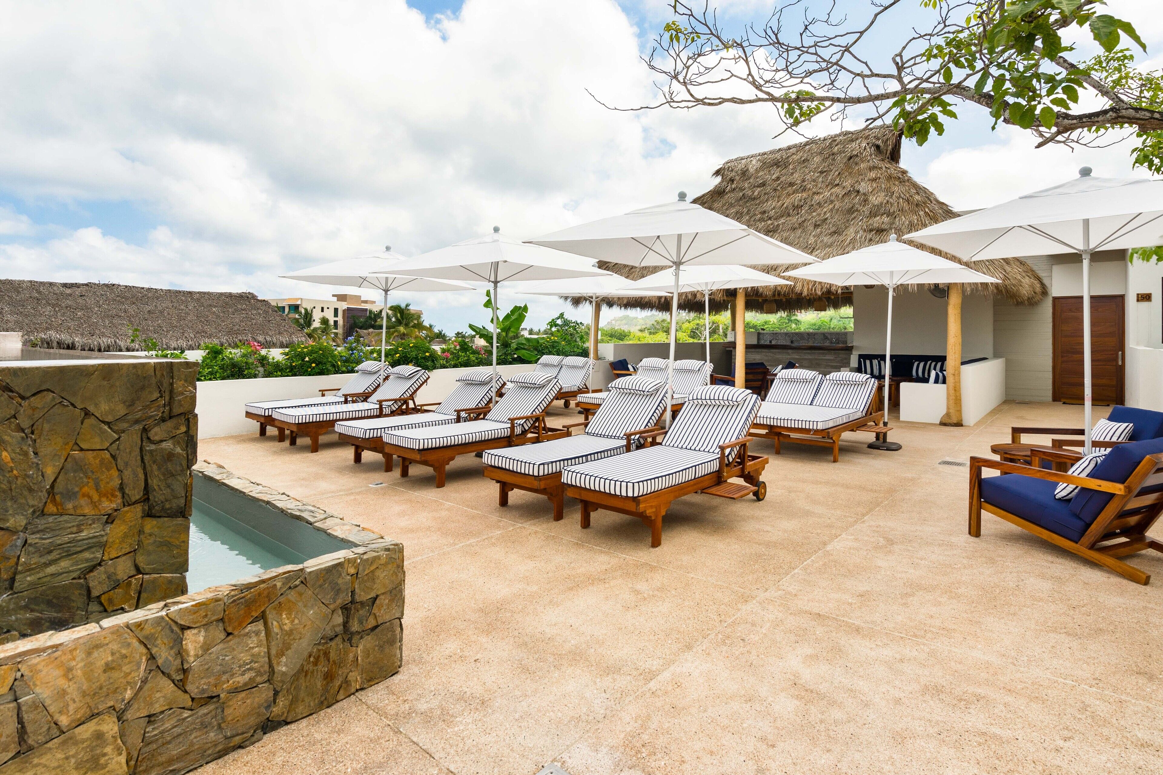 Outdoor pool, open 9:00 AM to 9:00 PM, free pool cabanas, pool loungers